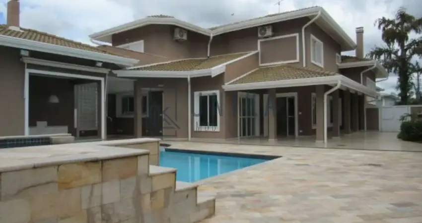 Casa de alto padrão em condomínio no Loteamento Alphaville Campinas para locação: 4 quartos, 4 suítes, 3 salas, 6 banheiros, 4 vagas e 600m².