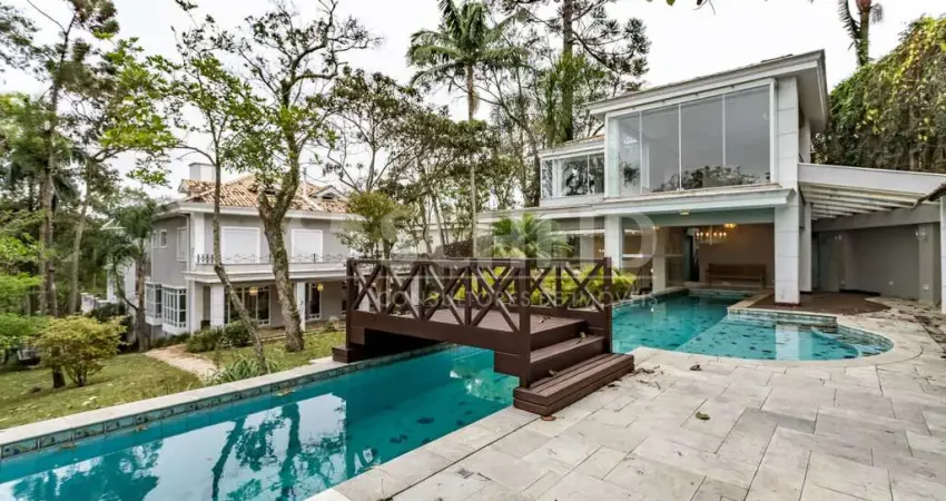 Casa de altíssimo padrão com 5 suítes dentro da chácara flora!