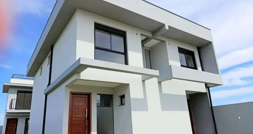 Casa financiável com 2 suítes a 300 metros da praia no loteamento Jardim Campeche.