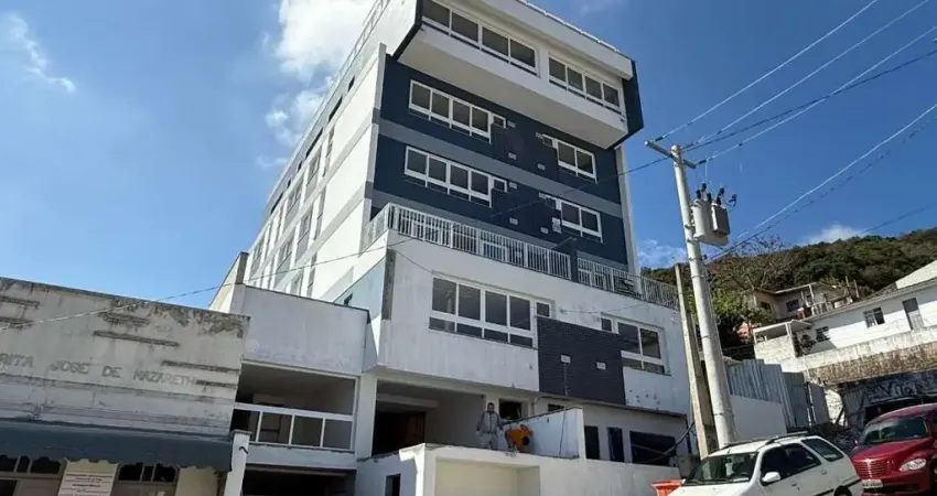 Apartamento tipo studio com 58,72 m², com varanda, 1 vaga, no centro