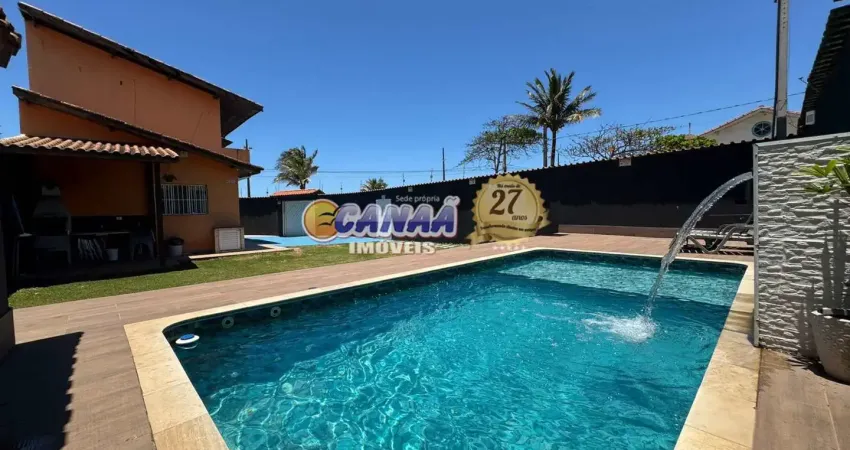 Casa com amplo quintal piscina e churrasqueira na praia de mongagua