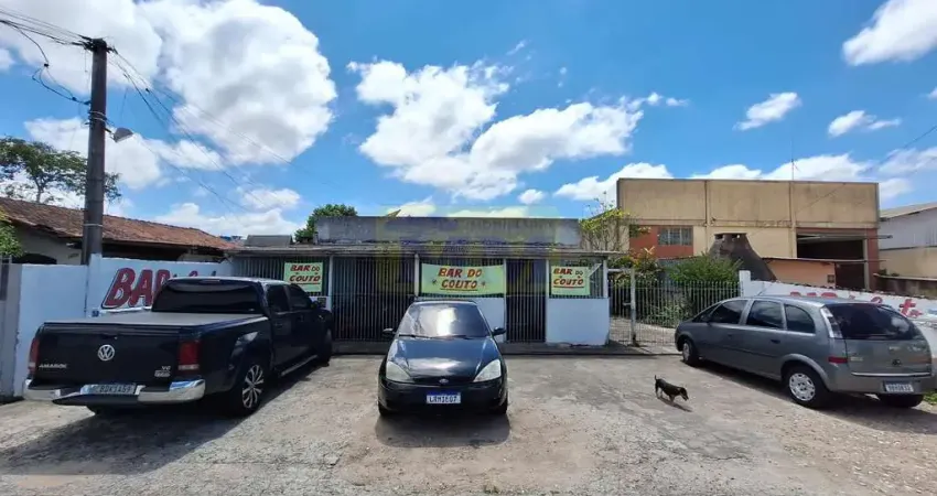 Terreno com 600m² no emiliano perneta com duas residencias e comércio