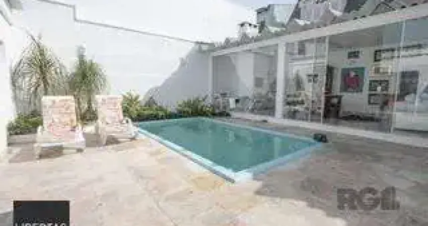 Casa com 3 quartos à venda na Rua Gustavo Schmidt, 592, Três Figueiras, Porto Alegre