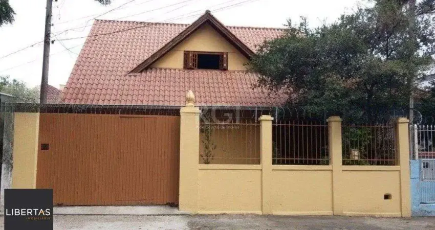 Casa com 3 quartos à venda na Rua Afonso Rodrigues, 263, Jardim Botânico, Porto Alegre