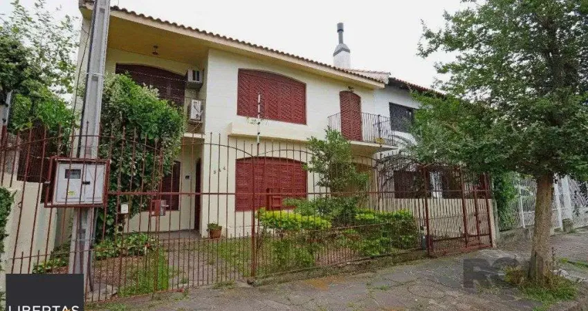 Casa com 5 quartos à venda na Rua Fátima, 344, Partenon, Porto Alegre