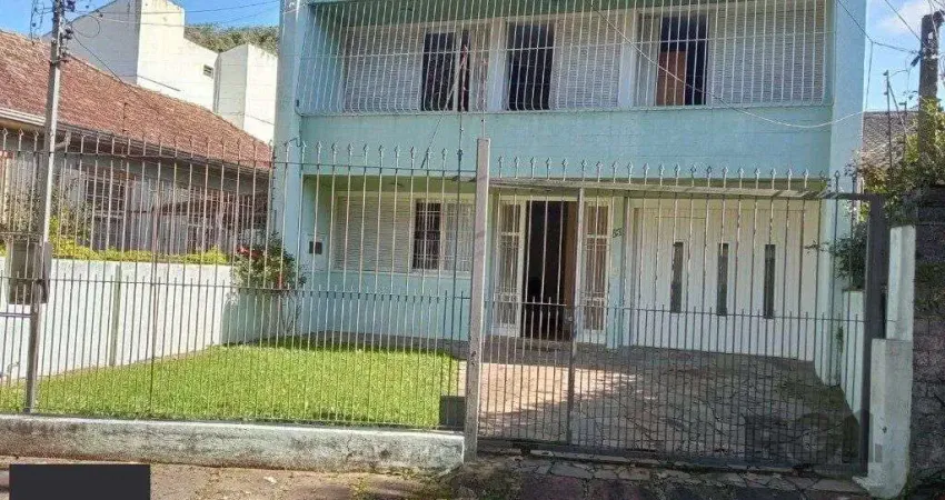 Casa com 4 quartos à venda na Rua Fagundes Varela, 83, Santo Antônio, Porto Alegre