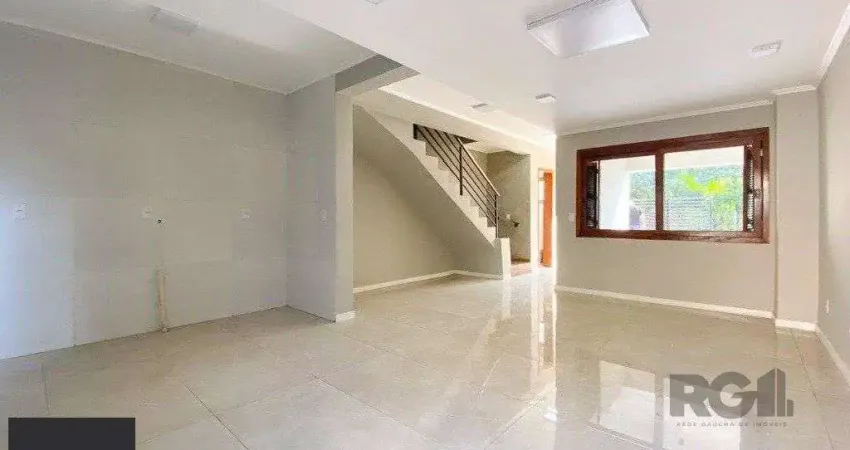 Casa com 3 quartos à venda na Rua Ronaldo Molina de Quadros, 420, Mário Quintana, Porto Alegre