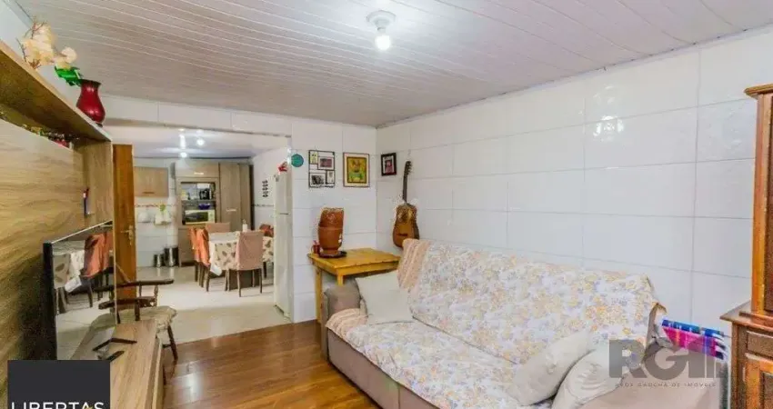 Casa com 2 quartos à venda na Rua Nilo Torres, 146, Coronel Aparício Borges, Porto Alegre