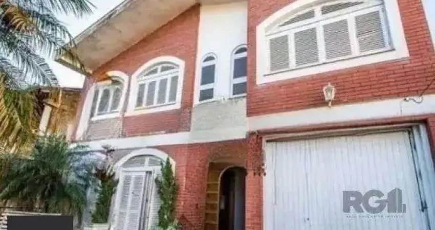 Casa sobrado no bairro Tristeza de 4 dormitórios 3 vagas para alugar