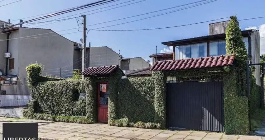 Casa com 3 quartos à venda na Avenida Guarujá, 140, Guarujá, Porto Alegre