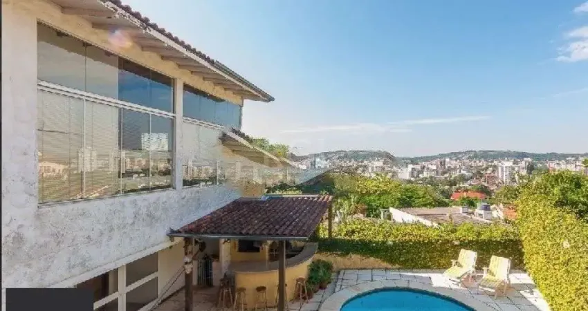 Casa com 5 quartos à venda na Rua Coroados, 536, Vila Assunção, Porto Alegre