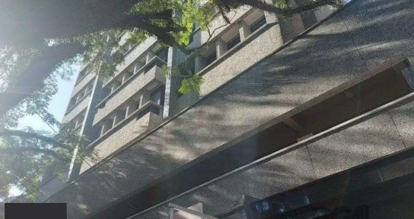 sala comercial, medindo 36,12 m² área privativa e 49,27 m² de área total, com 1 box coberto duplo, localizada no Moinhos de Vento