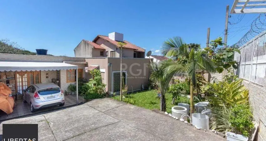 Casa para Venda - 370m², 4 dormitórios, sendo 1 suites, 6 vagas - Lomba do Pinheiro