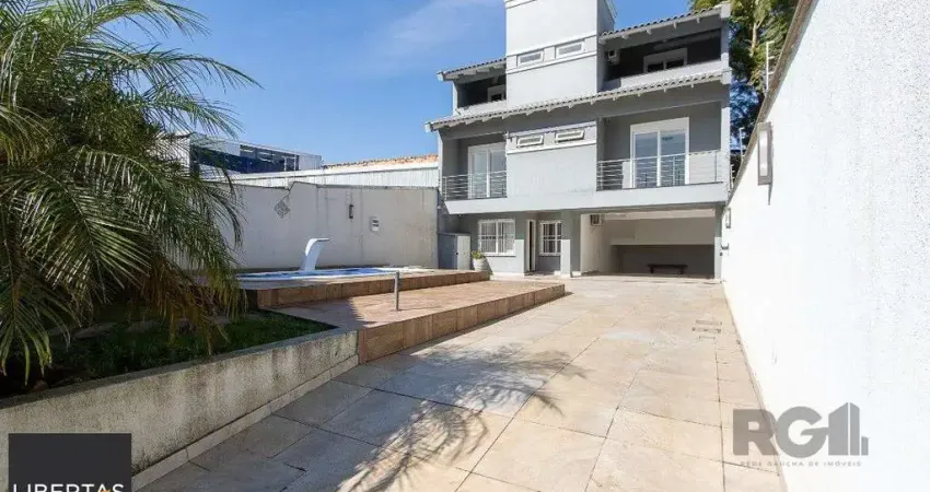 Casa com 4 quartos à venda na Avenida Nonoai, 724, Nonoai, Porto Alegre