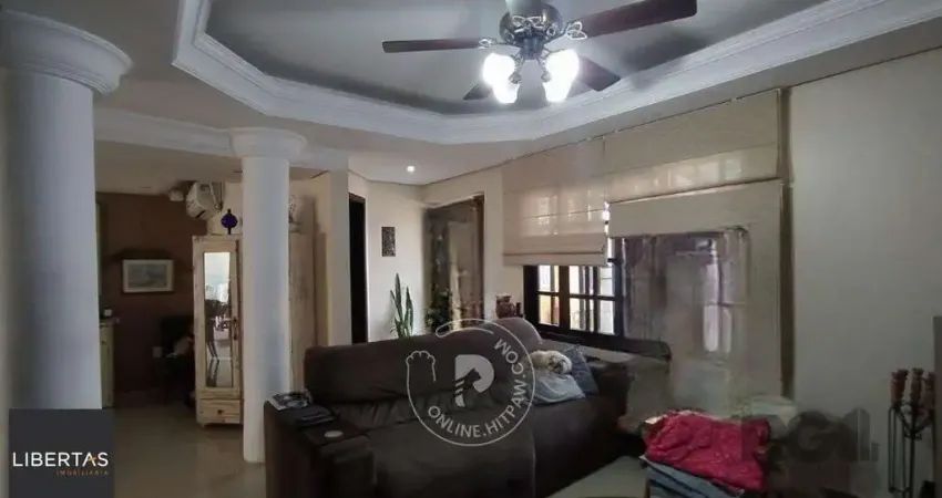 Casa com 3 quartos à venda na Rua Baldoino Bottini, 131, Hípica, Porto Alegre