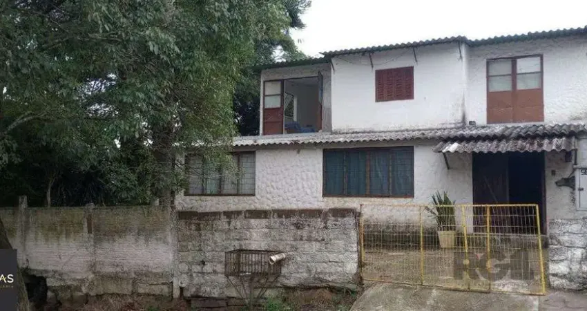 Casa com 5 quartos à venda na Rua Victor Silva, 582, Camaquã, Porto Alegre