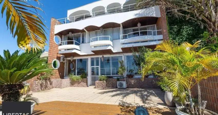 Casa com 4 quartos à venda na Rua Bororó, 25, Vila Assunção, Porto Alegre