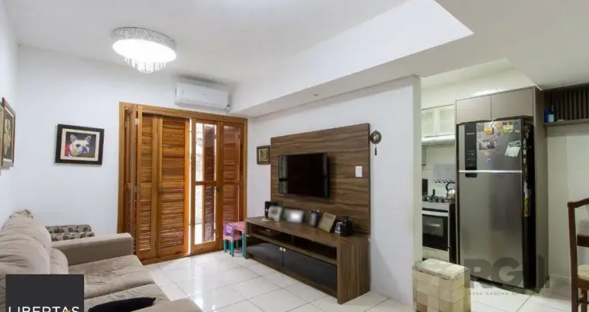 Casa em condomínio fechado com 3 quartos à venda na Rua São Sebastião do Cai, 119, Camaquã, Porto Alegre