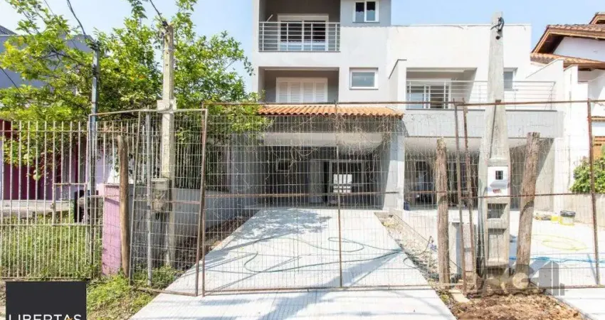 Casa com 3 quartos à venda na Rua Ari Peixoto Martins, 146, Espírito Santo, Porto Alegre