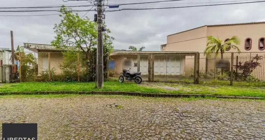 Casa com 5 quartos à venda na Rua Bororó, 699, Vila Assunção, Porto Alegre