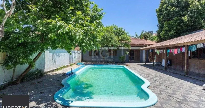 Casa com 5 quartos à venda na Rua Cassino, 56, Ipanema, Porto Alegre