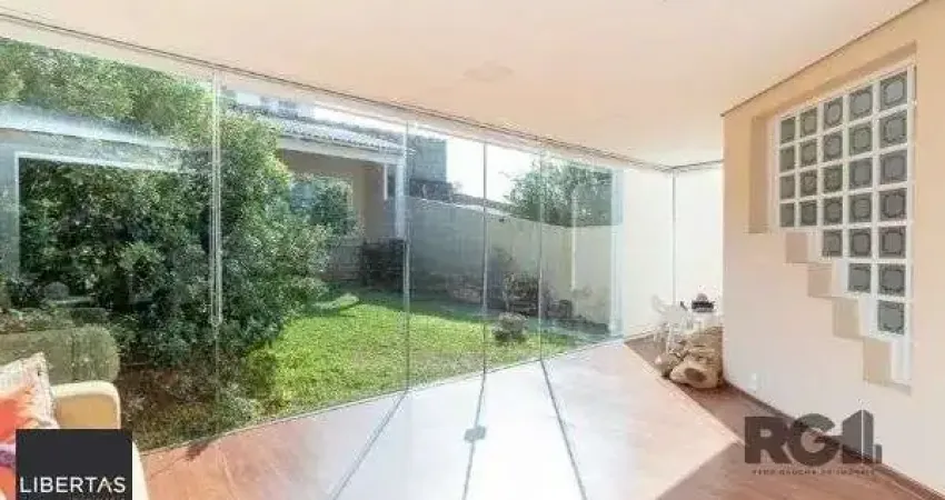 Casa com 3 quartos à venda na Rua Joaquim Cruz, 521, Santo Antônio, Porto Alegre