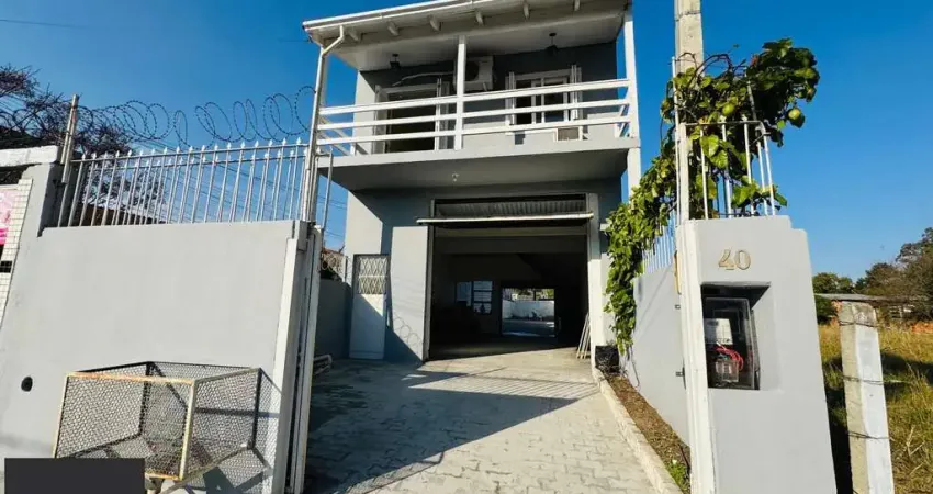 Casa com 2 quartos à venda na Rua Laranjeiras, 40, Restinga, Porto Alegre