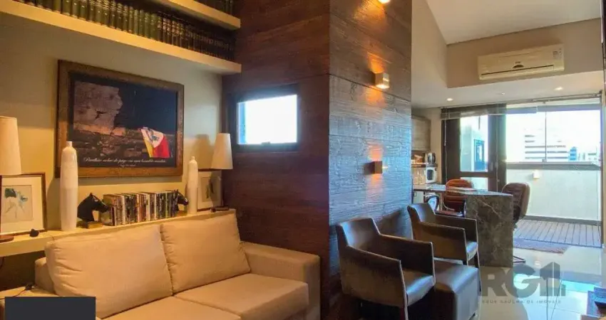 Sala mobiliada, com churrasqueira para happy hour e vista para o Guaíba