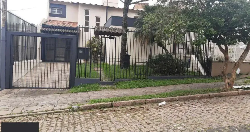 Casa com 3 quartos à venda na Rua Cláudio Manoel da Costa, 210, Jardim Itu Sabará, Porto Alegre