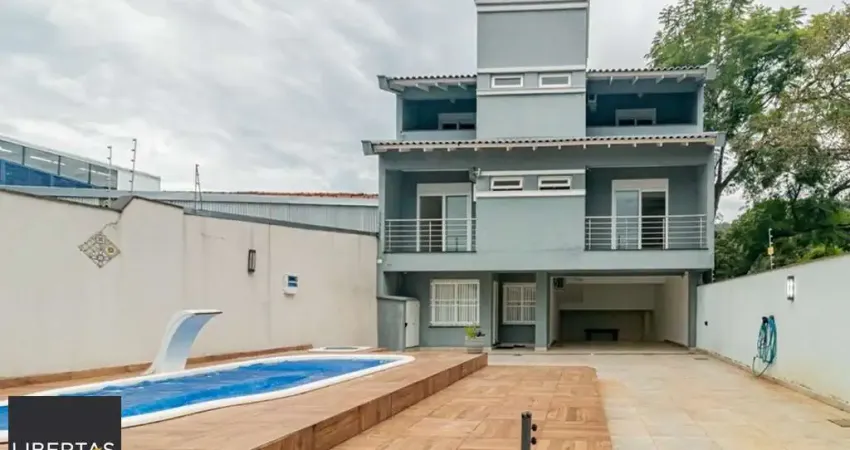 Casa com 4 quartos à venda na Avenida Nonoai, 724, Nonoai, Porto Alegre