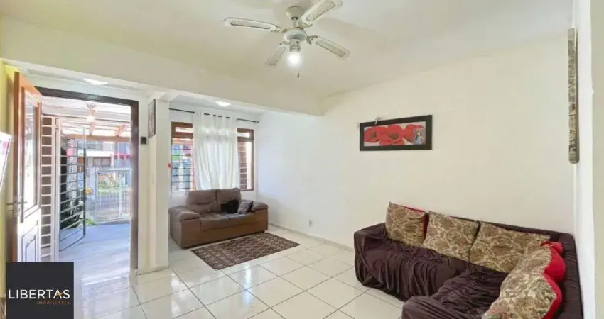 Casa de 2 dormitórios à venda Rua Heitor Kramer, Guarujá - Porto Alegre