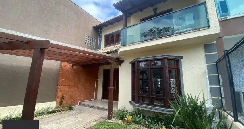 Casa com 3 quartos à venda na Rua Roberto Santini, 194, Hípica, Porto Alegre