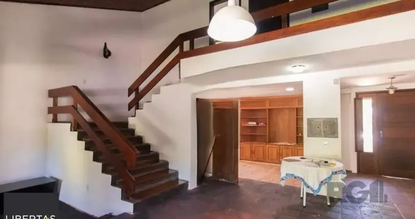 Casa com 3 quartos à venda na Avenida Monte Cristo, 46, Vila Nova, Porto Alegre