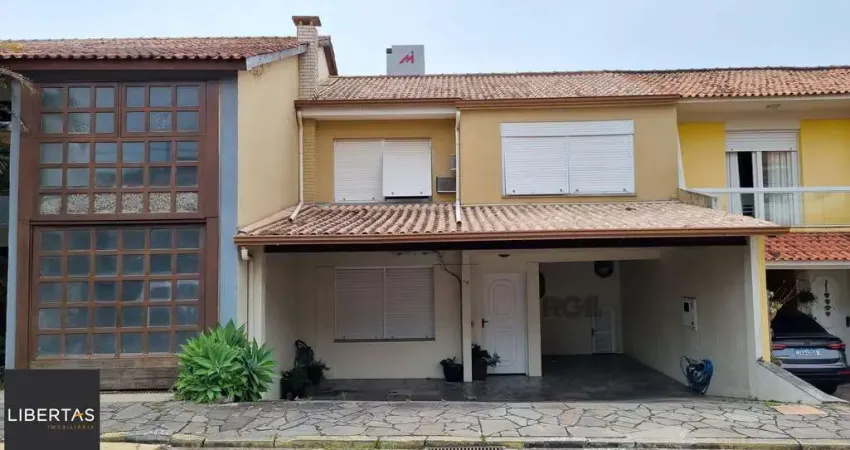 Casa em condomínio fechado com 3 quartos à venda na Rua Martim Afonso, 115, Santo Antônio, Porto Alegre