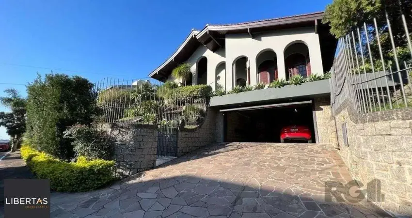 Casa em condomínio fechado com 4 quartos à venda na Rua Alcebíades Antônio dos Santos, 356, Nonoai, Porto Alegre