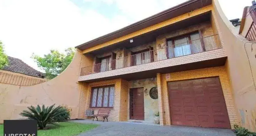 Casa com 3 quartos à venda na Avenida João Wallig, 119, Passo da Areia, Porto Alegre