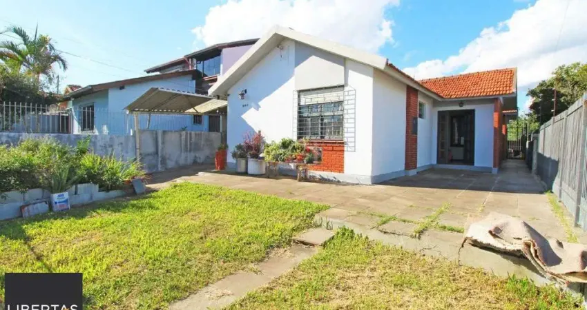 Casa 5 dormitórios, 1 suíte, 2 vagas de garagem, no bairro Camaquã, Poa/RS.