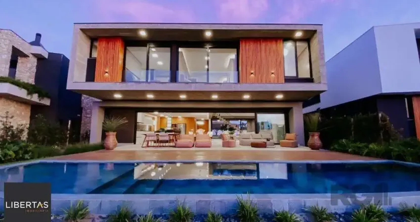 Espetacular mansão 5 suítes sendo 1 térrea no cond. Enseada em xangrila!