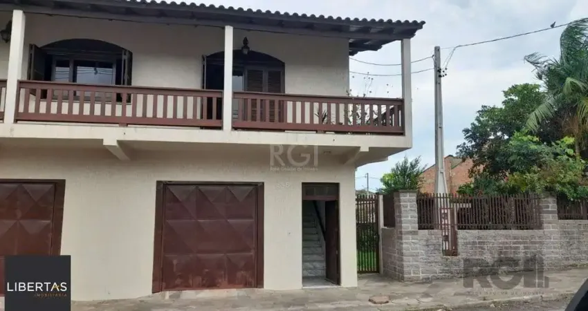 Casa com 3 quartos à venda na Rua Goitacaz, 336, Vila Monte Carlo, Cachoeirinha
