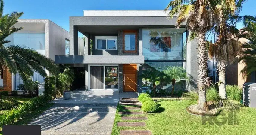 Sobrado à venda pagamento em 60x condomínio malibu beira lago com deck e piscina