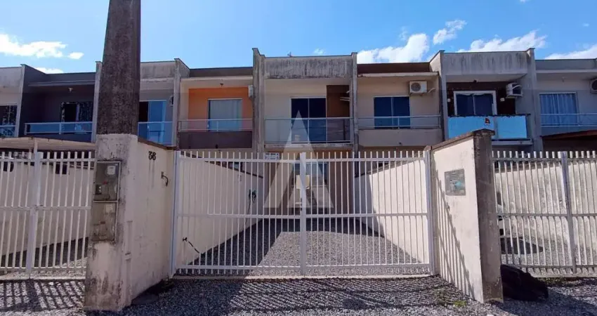 Geminado no bairro iririú com 2 quartos, sala de estar e jantar integradas, cozinha e 1 vaga de garagem.