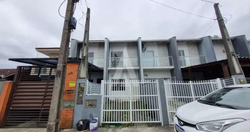 Geminado com 2 quartos e 1 vaga de garagem no bairro aventureiro.