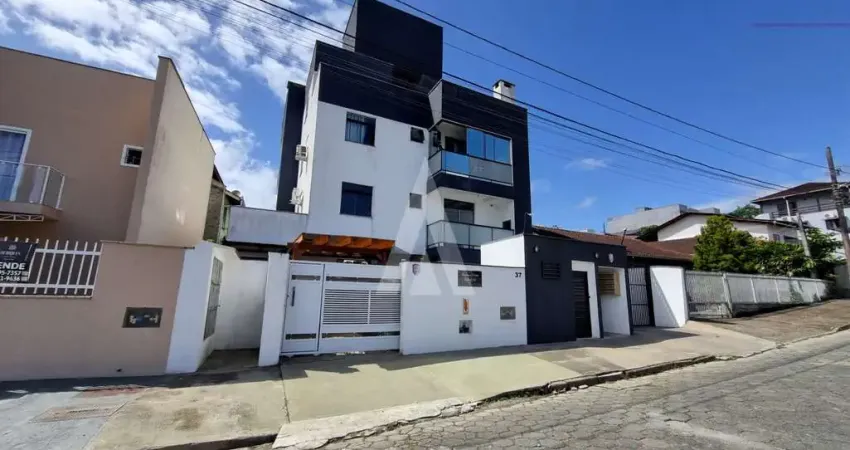 Apartamento com 2 quartos, sacada com churrasqueira e 1 vaga de garagem coberta no bairro itaum.