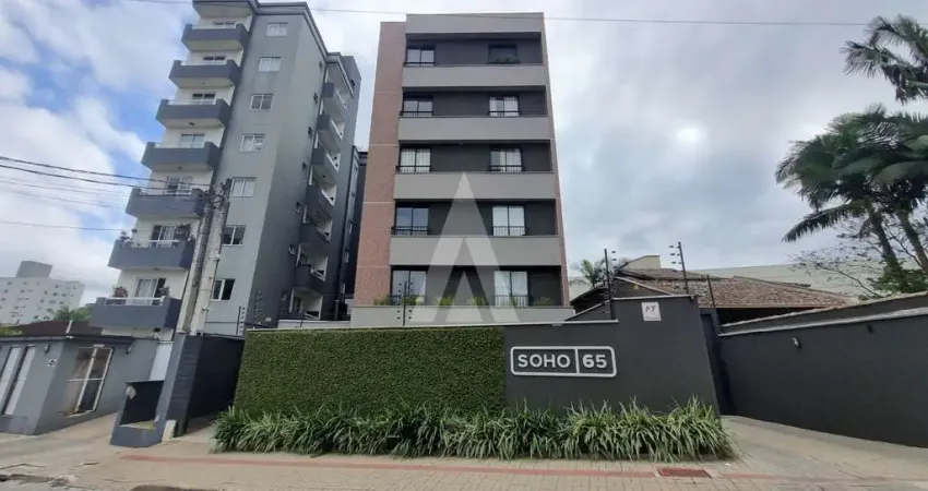 Apartamento com 2 quartos, sendo 1 suíte, prédio com elevador e 1 vaga de garagem