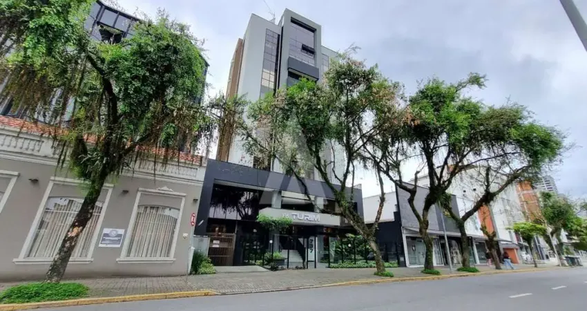 Sala comercial com elevador e 1 lavabo no centro de joinville.
