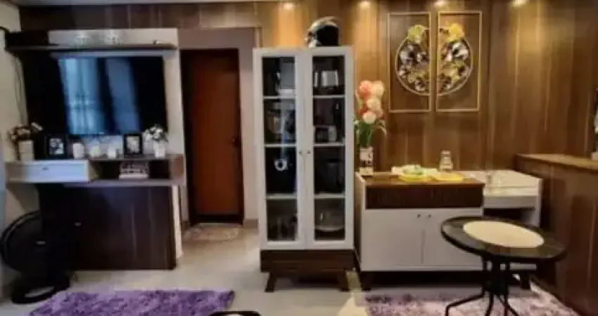 Vendo lindo apartamento com tres quartos segundo andar  com garagem em frente ao bloco