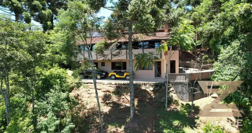 Casa com 4 dormitórios à venda, 275 m² por R$ 1.500.000,00 - Alto da Vila Inglesa - Campos do Jordão/SP
