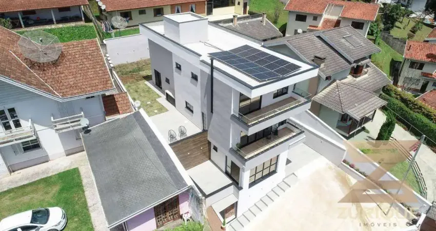 Casa com 4 dormitórios à venda, 308 m² por R$ 2.380.000,00 - Abernéssia - Campos do Jordão/SP