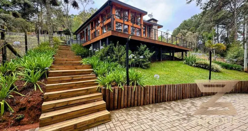 Casa com 3 dormitórios à venda, 130 m² por R$ 1.900.000,00 - Cidade do Sol - Campos do Jordão/SP