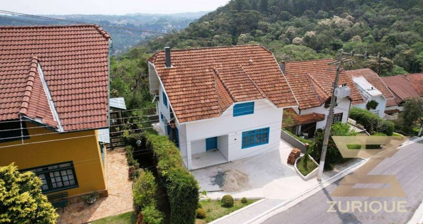 Casa com 3 dormitórios à venda, 250 m² por R$ 950.000,00 - Capivari - Campos do Jordão/SP